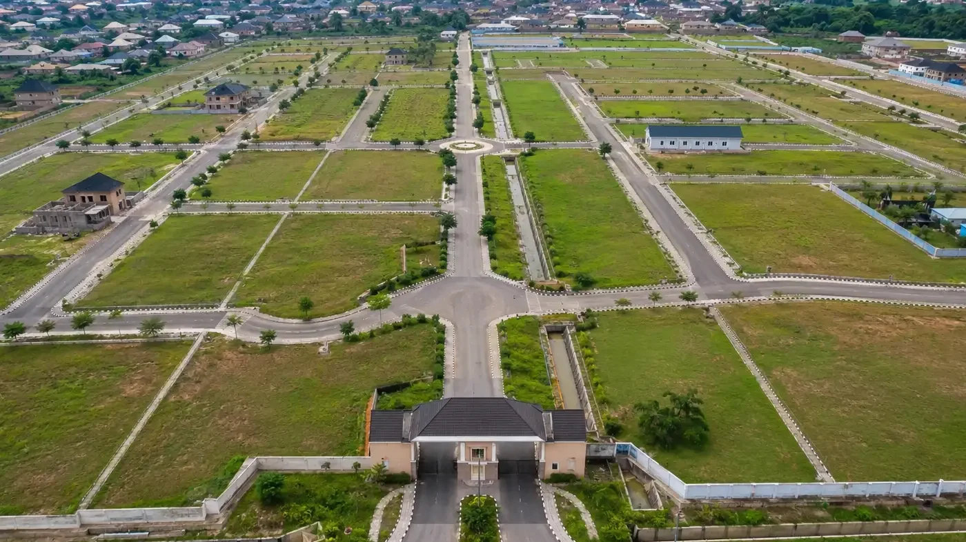 Aerial view of a planned residential estate layout in Nigeria showing road network drainage and plots